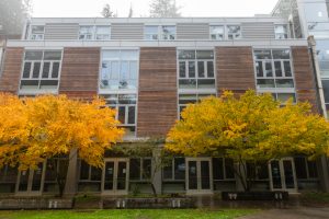 Photo of the Humanities 1 building with fall trees