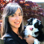 Emine Hande Tuna holding a dog