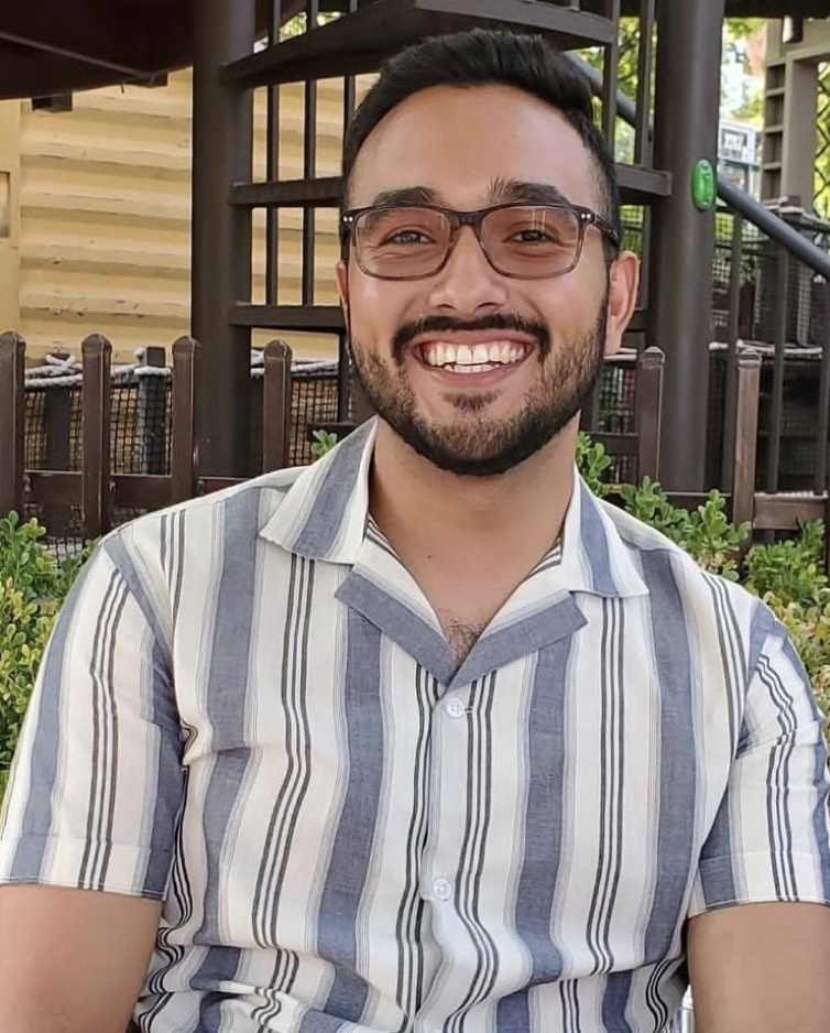 smiling person in a striped shirt