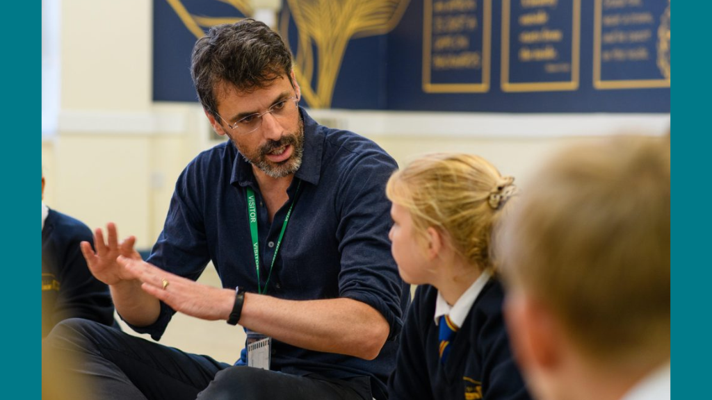 Man talks to student about acting/shakespeare